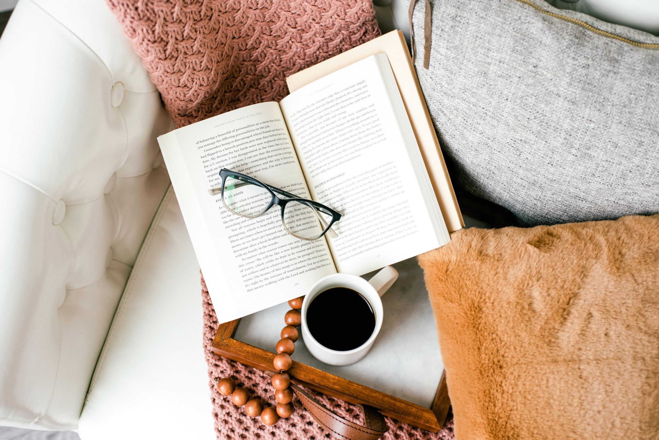 glasses, book and coffee cup